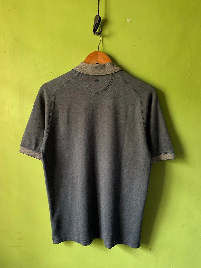 Vintage 1990s Adidas golf button up polo (Category: Tshirts & Polo Shirts ) located in Cagayan de Oro. Submitted by premium_thrifts (Listing ID 1443179847, Image 3). Description: Gray green colorway. Good condition. Issues: minimal lints, and 2 scratches - MEASUREMENTS: L26.2/27.5" x W20.5" Fits Medium - Large Add shipping fee (via JRS or J&T).