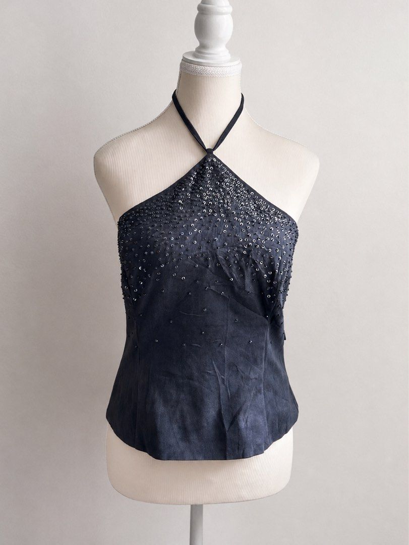 Vintage 2000s Embellished Sequin Halter Neck Top (Category: Sleeveless) located in Pasig City. Submitted by declutterwithme_agb (Listing ID 1443314248, Image 1). Description: - Dark grey halter neck top - Covered in shimmering sequins and beads around the bust - Zip closure at the back - Ties at the neck - Ideal for parties or a night out.