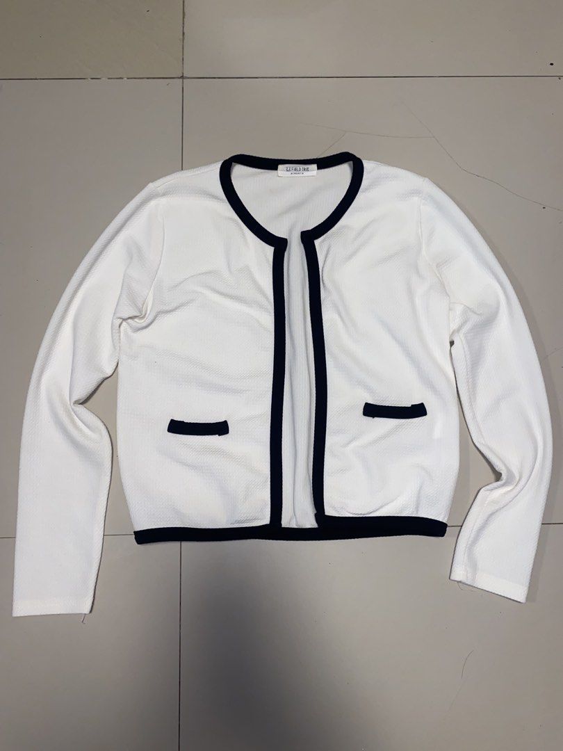White Cropped Cardigan with Black Trim (Category: Coats, Jackets and Outerwear) located in Manila. Submitted by jellywhite28 (Listing ID 1443287220, Image 1). Description: - Korean white cropped cardigan - Black trim detail on edges and pockets - Long sleeves - Ideal for layering - Versatile for casual or dressed-up looks.