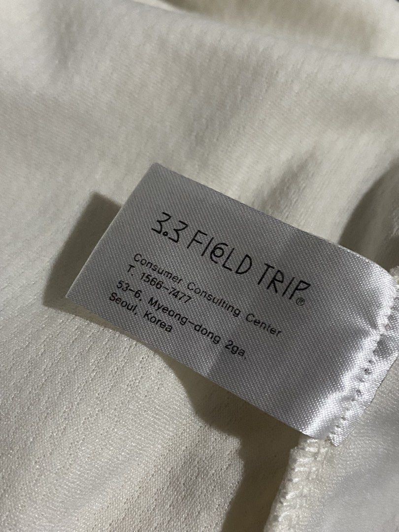 White Cropped Cardigan with Black Trim (Category: Coats, Jackets and Outerwear) located in Manila. Submitted by jellywhite28 (Listing ID 1443287220, Image 3). Description: - Korean white cropped cardigan - Black trim detail on edges and pockets - Long sleeves - Ideal for layering - Versatile for casual or dressed-up looks.