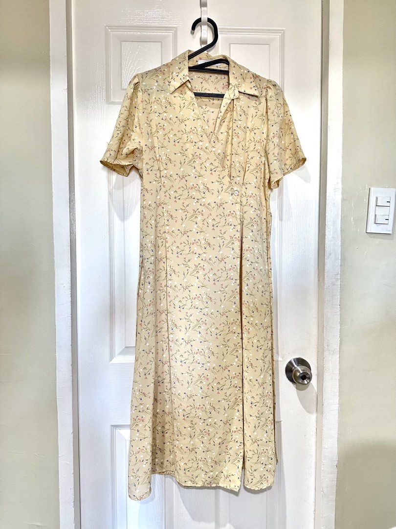 Yellow Floral Wrap-around Dress (Category: Dresses) located in Mandaluyong City. Submitted by busybugzy (Listing ID 1443282001, Image 2). Description: - Yellow midi dress with a dainty floral print. - Features a classic collared neckline and short sleeves. - Adjustable tie at the back for a customized fit..
