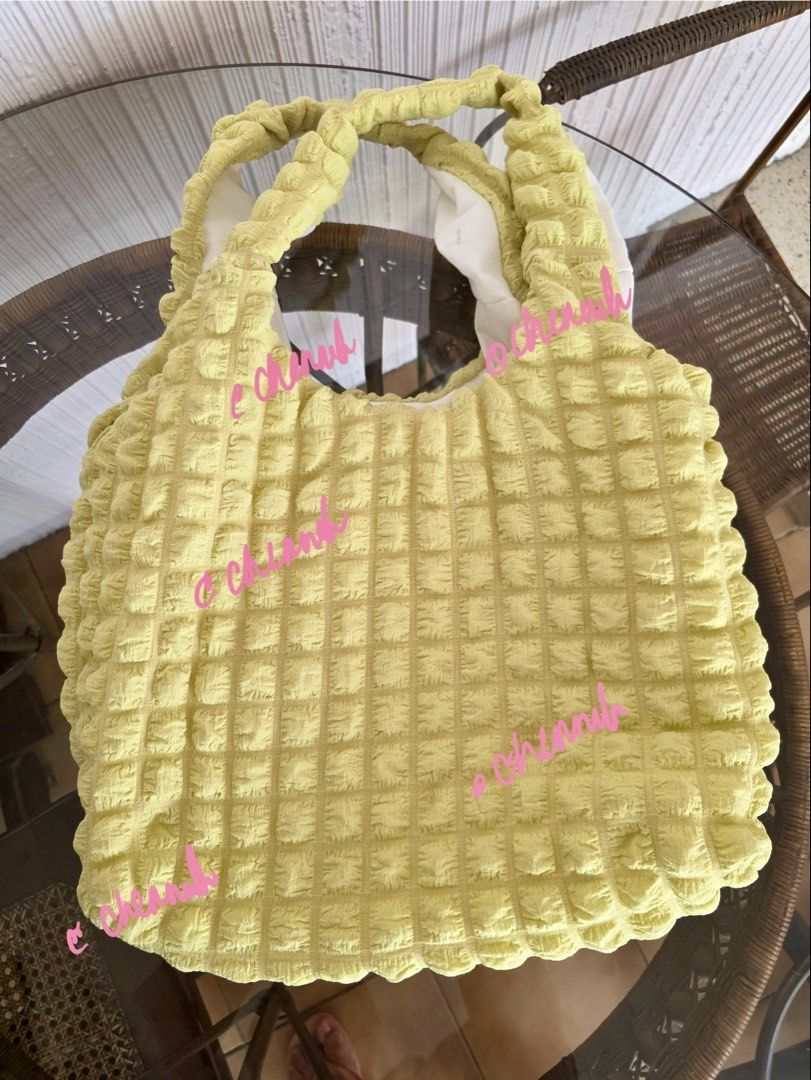 Yellow Textured Tote Bag with Ruched Handles (Category: Tote Bags) located in Pasig City. Submitted by jennasantos (Listing ID 1443288475, Image 1). Description: - Adorable yellow tote bag - Features a unique all-over textured pattern - Soft, ruched handles for comfort - Lined with white fabric inside - Ideal size for everyday essentials - Great for casual outings - Bought from Thailand SRP: P680 Shipping from Pasig - to be shouldered by buyer Sh