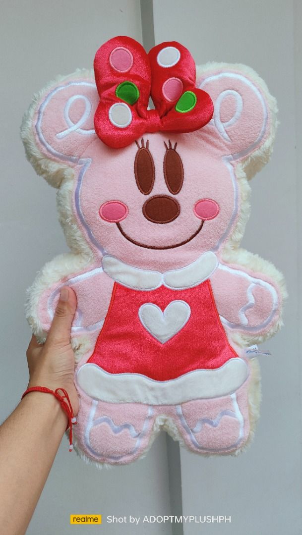 18" 2-in-1 Mickey-Minnie Gingerbread Cushion (Category: Cushions & Throws) located in Taguig. Submitted by adopt.my.plush.ph (Listing ID 1443448777, Image 3). Description: ‼️Last Price (LP) Posted *as is, WYSIWYG This limited-edition item was originally released for the Disney Christmas event in Japan. Brand: Tokyo Disney Resort Design: Reversible plush cushion featuring a pink gingerbread theme. One side displays Minnie Mouse wearing a red dress