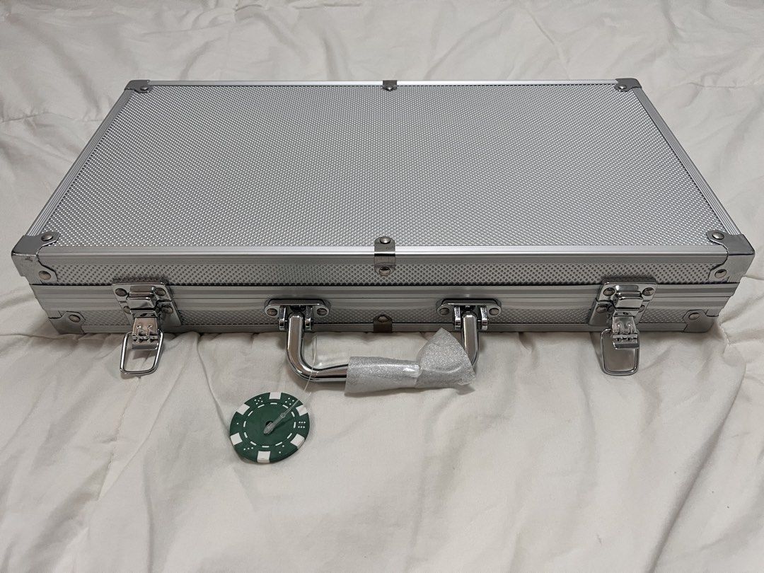 300-Piece Poker Set with Aluminum Case (Category: Board Games & Puzzles) located in Baguio. Submitted by adelfa2018 (Listing ID 1443452502, Image 3). Description: - Complete 300-piece poker set - Includes chips in various colors - NO DECK OF CARDS, yun lang ang kinuna at nilaro na ng junakis - Includes dealer, small blind, and big blind buttons - Sturdy aluminum case with a handle and metallic finish - Ideal for game nights with friends.