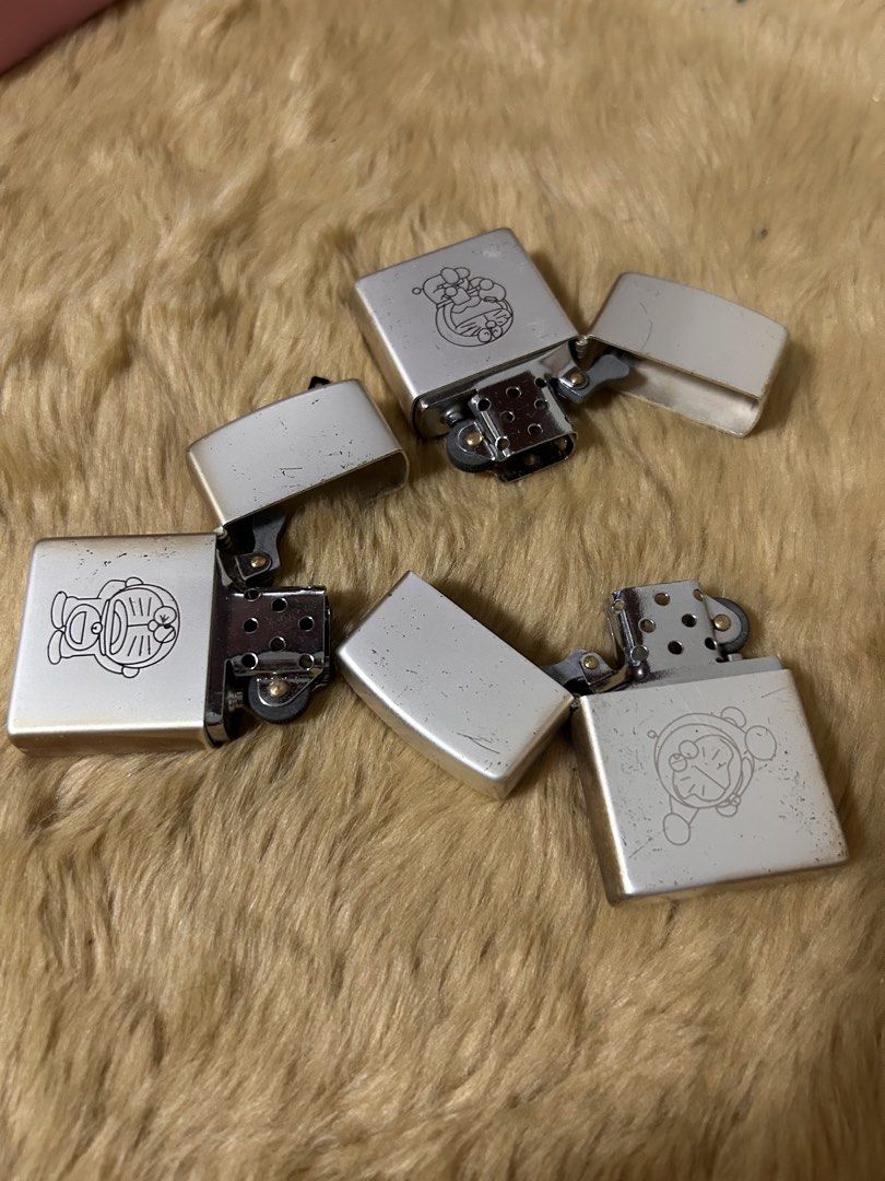 3pcs Silver Plated Vintage Windproof Lighter Doraemon Print (Category: Vintage Collectibles) located in Bulacan. Submitted by mecrafts4u.olstr (Listing ID 1417391830, Image 3). Description: .