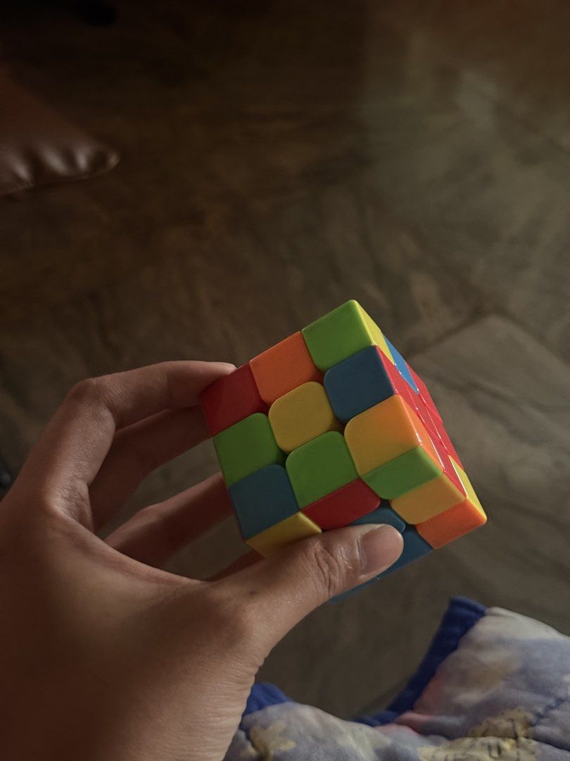 3x3 Speed Rubiks Cube (Category: Board Games & Puzzles) located in Manila. Submitted by thriftchic__ (Listing ID 1443329561, Image 2). Description: - Rubiks cube - Ideal for cubing enthusiasts - Smooth and fast turning - Minor sticker peeling (still functional and fun) - Great for practice and casual solving.