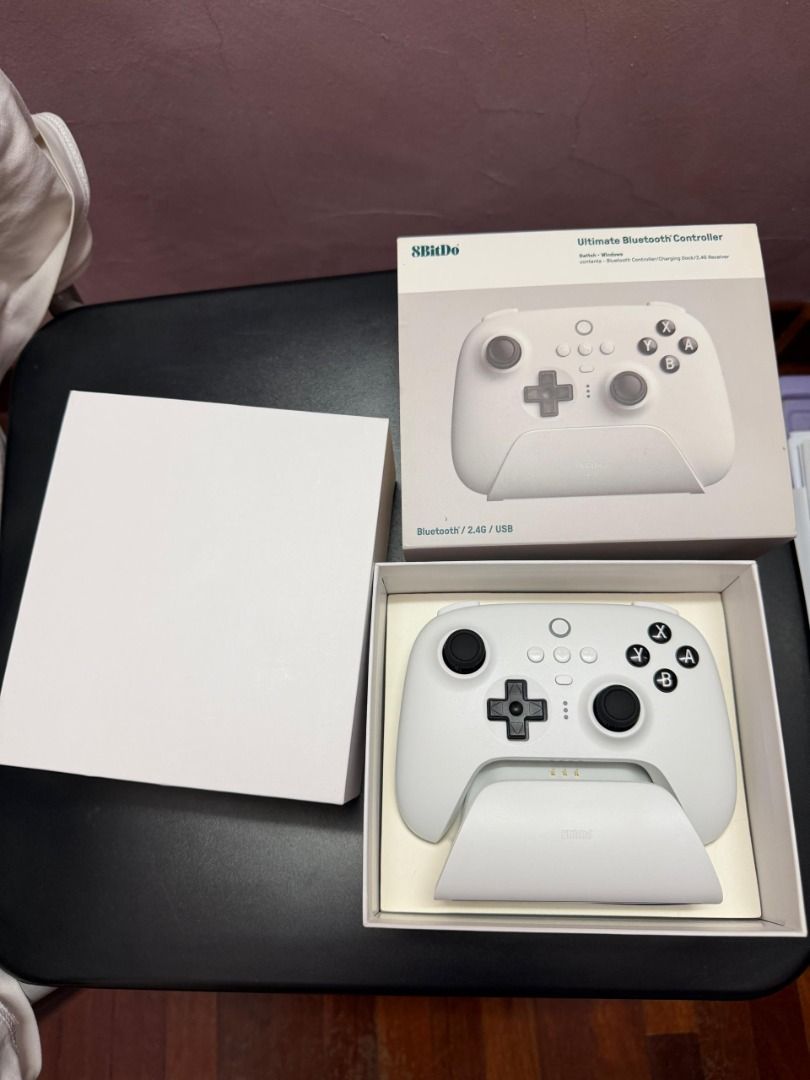 8BitDo Ultimate Bluetooth Controller White (Category: Controllers) located in Kuala Lumpur. Submitted by michaelpr45090 (Listing ID 1443469854, Image 2). Description: - White 8BitDo Ultimate Bluetooth Controller Switch + Windows - Versatile connectivity: Bluetooth and 2.4G - Comes with charging dock - Original packaging included - Brand new wey 99!.