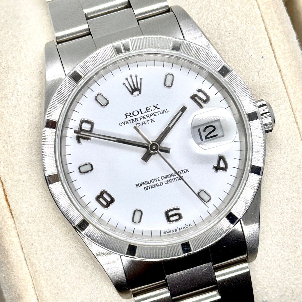 | MINT | 2000 Rolex OP34 Oyster Date Fluted Bezel White Arabic Racing Dial 15210 [ 15200 16234 115200 1500 15203 15233 15234 ] (Category: Watches) located in Singapore. Submitted by horizonluxury (Listing ID 1443419611, Image 1). Description: Rolex Oyster Date OP34 White Fluted Bezel Brand: Rolex Model: 15210 Dated: Circa 2000 [ A Serial / No Pinhole ] Remarks : Watch Only [ No Cert ] - Great condition 97% - Simple yet Stylish. The OP34 Oyster Da