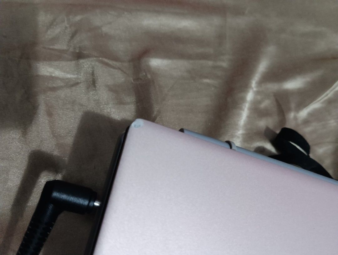 Acer Aspire 5 Laptop intel i3 - Rose Gold (Category: Laptops & Notebooks) located in Tarlac. Submitted by plglomboy48394 (Listing ID 1443393005, Image 3). Description: - Rose gold Acer Aspire 5 laptop - Opened to show keyboard and screen - Minor scuff mark on one corner - Includes charger - Ready for a new owner.