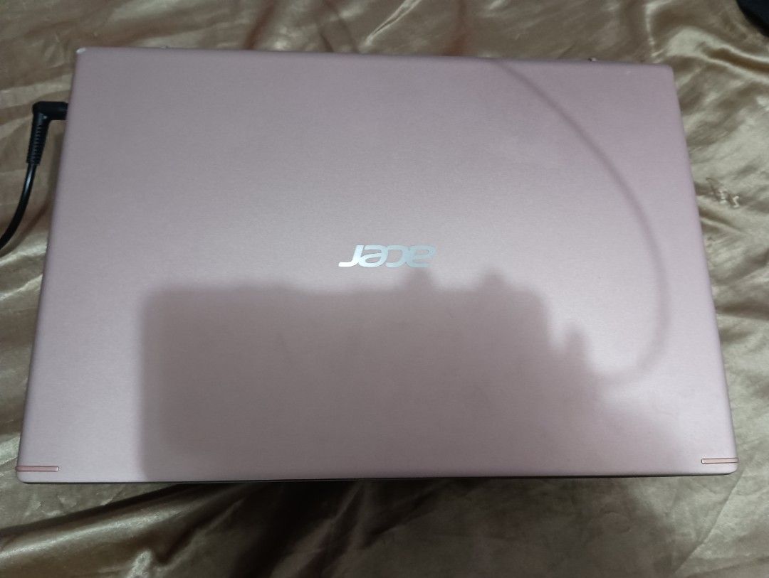 Acer Aspire 5 Laptop intel i3 - Rose Gold (Category: Laptops & Notebooks) located in Tarlac. Submitted by plglomboy48394 (Listing ID 1443393005, Image 1). Description: - Rose gold Acer Aspire 5 laptop - Opened to show keyboard and screen - Minor scuff mark on one corner - Includes charger - Ready for a new owner.