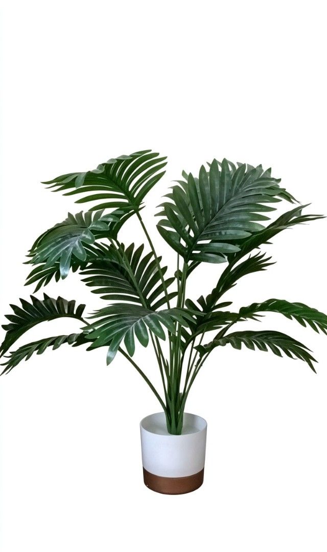 Artificial Palm Plant in White Pot (Category: Artificial Plants & Flowers) located in Manila. Submitted by _louisse (Listing ID 1443359469, Image 1). Description: - Realistic artificial palm plant - Comes in a stylish white pot with copper accent - Enhances any room with a touch of green - Low maintenance, no watering required - Ideal for home decor.