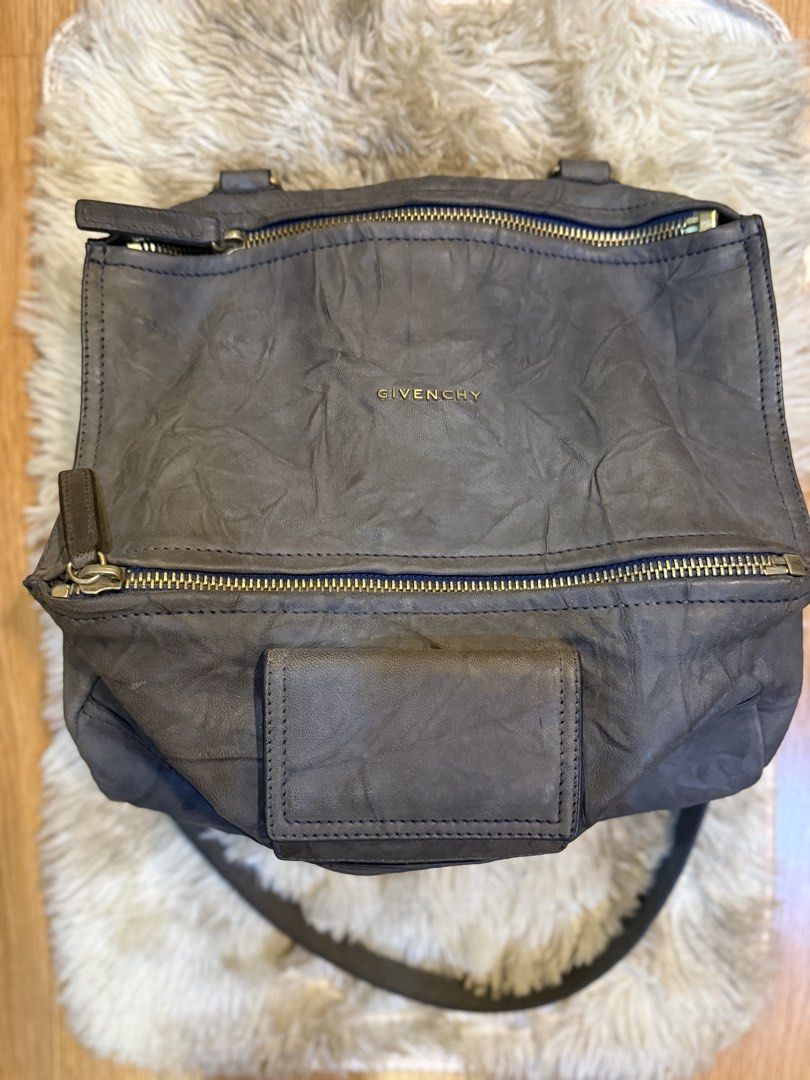 Authentic Givenchy Pandora Bag (Category: Luxury Bags & Wallets) located in Manila. Submitted by hairaen (Listing ID 1443481896, Image 1). Description: - Genuine Grey Leather Givenchy Antigona Bag - Elegant Gold Hardware and Zippers - Soft Leather with a Slight, Natural Crease - Includes Detachable Shoulder Strap - Ample Interior Space for Essentials - Ideal for Everyday Carry.
