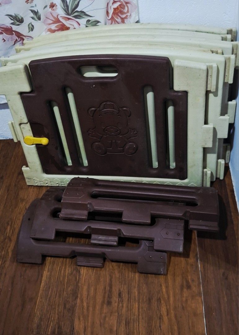 Baby Playpen Panels with Bear Design (Category: Cots & Cribs) located in Santa Rosa. Submitted by royyumireon27 (Listing ID 1443434093, Image 1). Description: - Set of baby playpen panels in beige and brown. - Features adorable bear designs on some panels. - Easy to connect and assemble for a secure play space. - Includes extra connecting pieces for customization. - Perfect for keeping your little one safely contained..