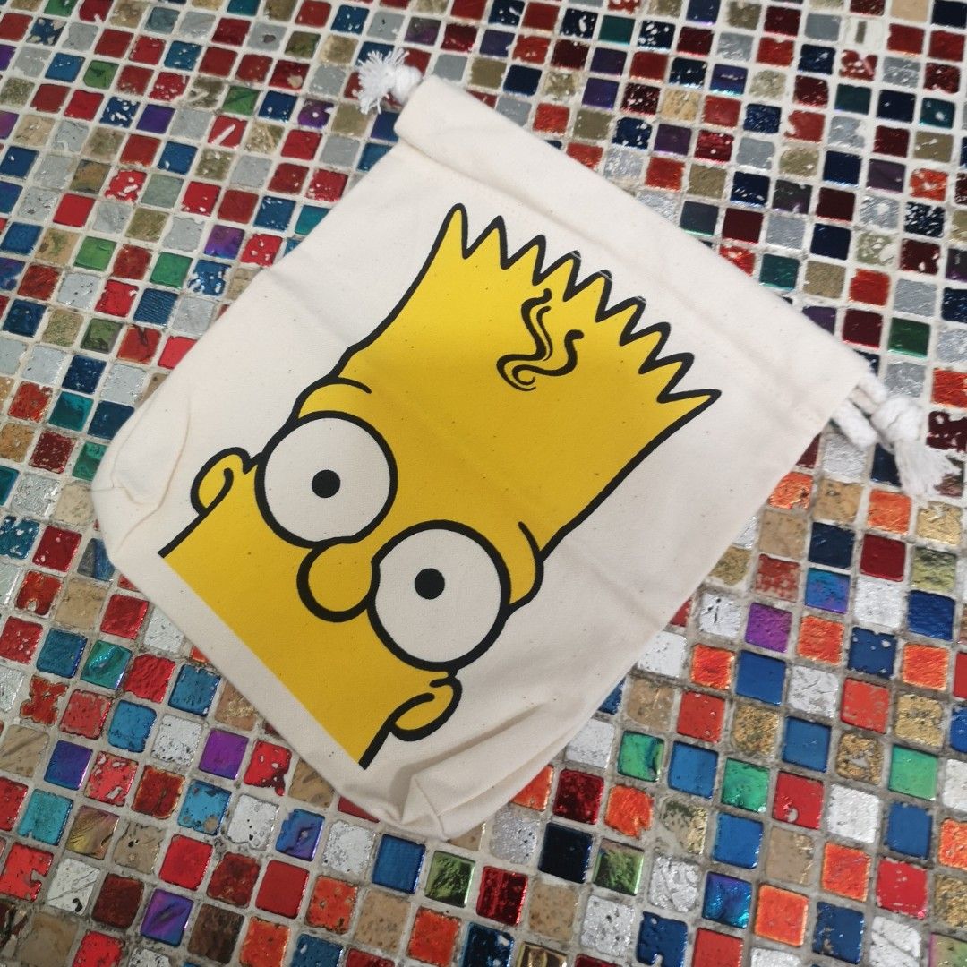 Bart Simpson Drawstring Pouch Bag (Category: Purses & Pouches) located in Singapore. Submitted by mariolee (Listing ID 1443485721, Image 1). Description: - Adorable Bart Simpson design - Perfect for storing coins, jewelry, makeup, or other small essentials - Secure drawstring closure - Durable canvas material - Fun and portable for everyday use - A must-have for any Simpsons fan! - 20cm x 23cm FREE WITH ANY OTHER PURCHASED FROM MY LISTING.