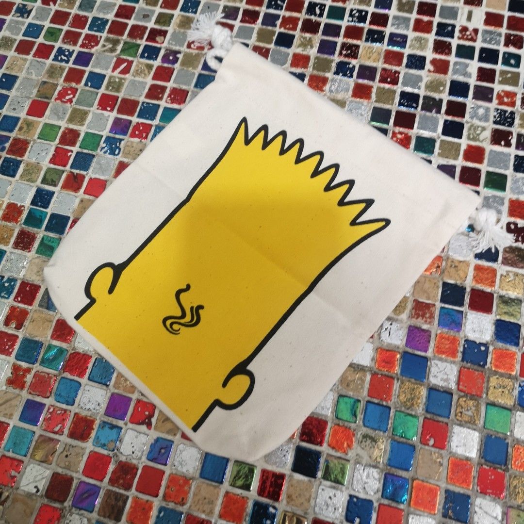 Bart Simpson Drawstring Pouch Bag (Category: Purses & Pouches) located in Singapore. Submitted by mariolee (Listing ID 1443485721, Image 2). Description: - Adorable Bart Simpson design - Perfect for storing coins, jewelry, makeup, or other small essentials - Secure drawstring closure - Durable canvas material - Fun and portable for everyday use - A must-have for any Simpsons fan! - 20cm x 23cm FREE WITH ANY OTHER PURCHASED FROM MY LISTING.