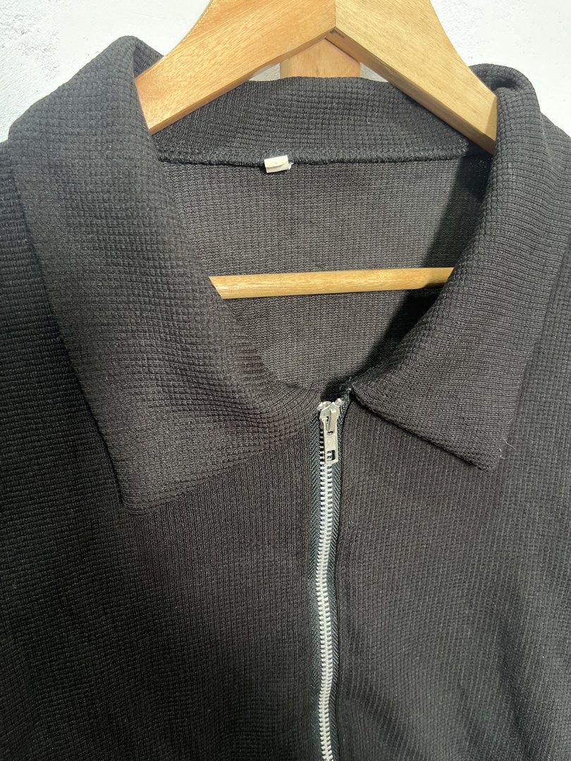 Black Cropped Zip-Up Jacket with Collar (Category: Coats, Jackets and Outerwear) located in Baguio. Submitted by threadsandcrafts (Listing ID 1443360413, Image 2). Description: - Black cropped jacket - Zip-up front with collar - Long sleeves with elastic cuffs - Shaped hemline - Estimated size: S-M - Ideal for layering over outfits.