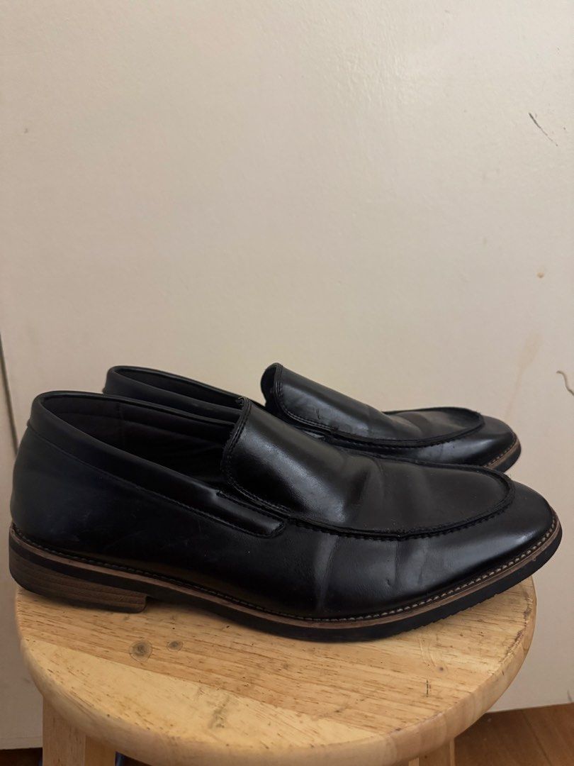 Black Leather Loafers (Category: Loafers) located in Makati City. Submitted by ja_declutters (Listing ID 1443416502, Image 2). Description: - SIZE 43 (Fits US 9.5) -Classic black leather loafers - Easy slip-on style - Versatile: dress up or down - Minor scuffs on leather, overall sharp appearance - Ideal for work or casual wear.