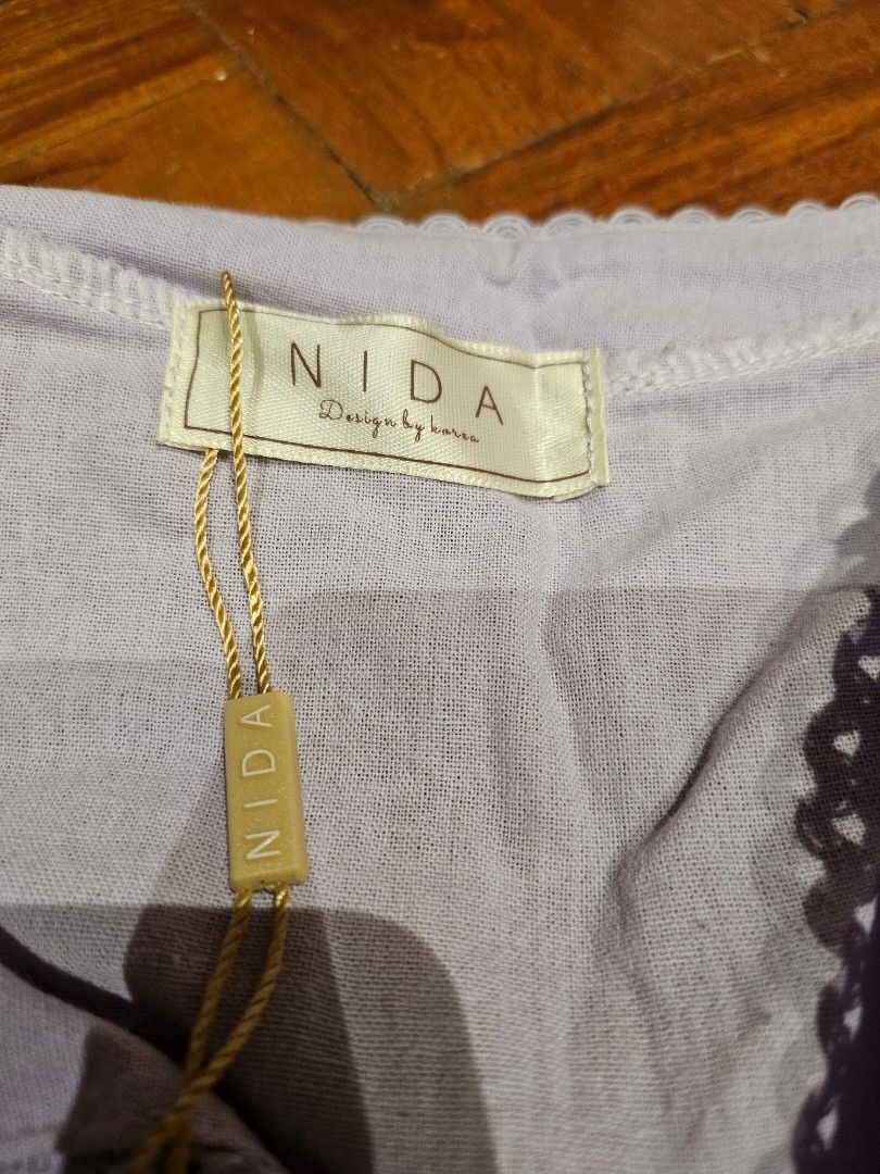 BNWT Lilac Ruffled Linen Crop Blouse with Front Ties (Category: Others Tops) located in Paranaque City. Submitted by dlilly (Listing ID 1443452506, Image 3). Description: Selling this gorgeous lilac/lavender linen crop top. I bought it in Thailand but never got around to wearing it. Was told it's free size, but width is around 17.5" when laid flat. RFS: Decluttering!.