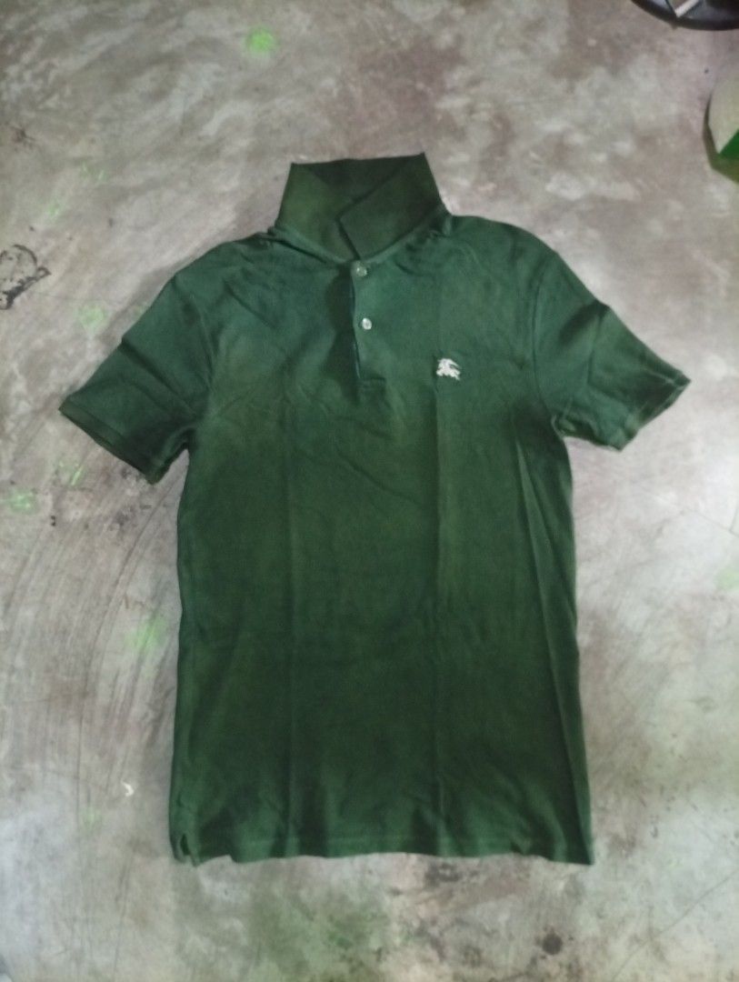 Burberry Polo Shirt (Category: Luxury Apparel) located in Manila. Submitted by mojonarchives (Listing ID 1443325343, Image 1). Description: Burberry Polo Shirt Size: Large Dimes:W18xL28 Condition Goods Colorate 9/10 issue: minimal Faded Delivery Every Saturday 🙏♥️ Location Quezon city MOP Gcash MOD Jnt Express.