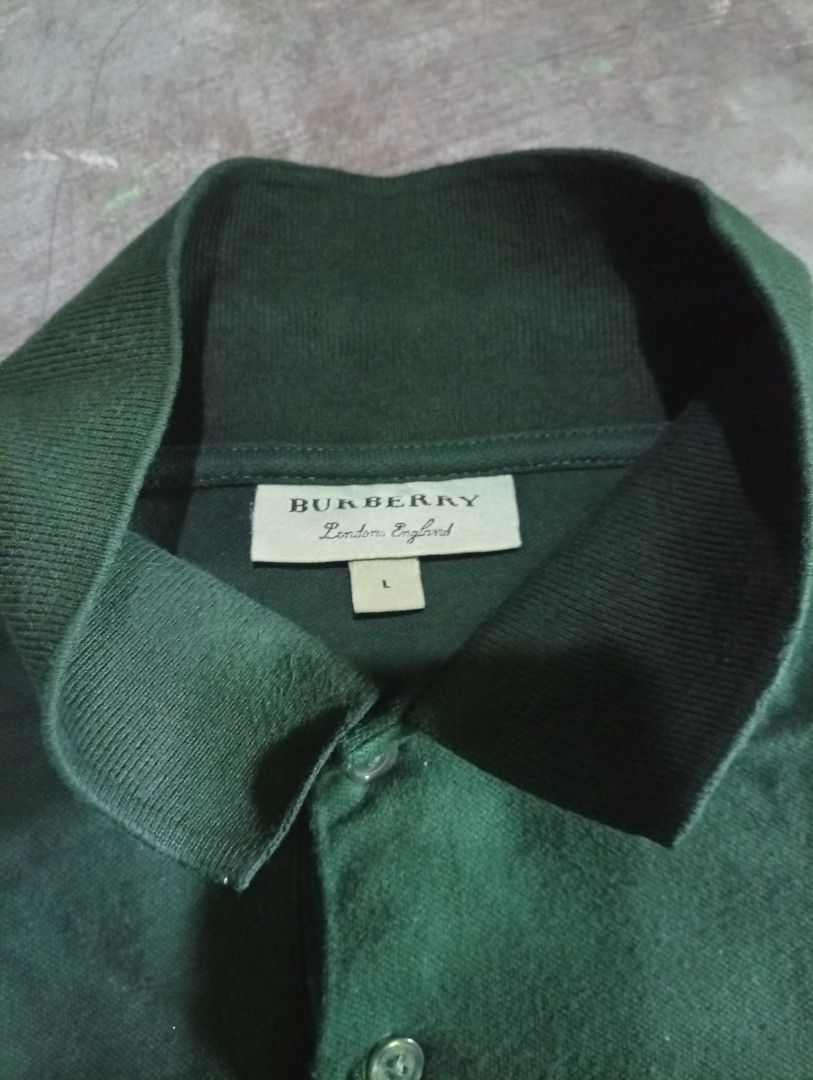 Burberry Polo Shirt (Category: Luxury Apparel) located in Manila. Submitted by mojonarchives (Listing ID 1443325343, Image 3). Description: Burberry Polo Shirt Size: Large Dimes:W18xL28 Condition Goods Colorate 9/10 issue: minimal Faded Delivery Every Saturday 🙏♥️ Location Quezon city MOP Gcash MOD Jnt Express.