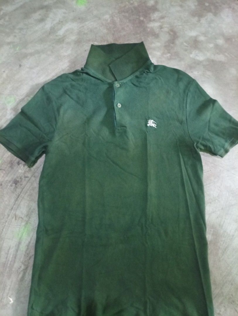 Burberry Polo Shirt (Category: Luxury Apparel) located in Manila. Submitted by mojonarchives (Listing ID 1443325343, Image 2). Description: Burberry Polo Shirt Size: Large Dimes:W18xL28 Condition Goods Colorate 9/10 issue: minimal Faded Delivery Every Saturday 🙏♥️ Location Quezon city MOP Gcash MOD Jnt Express.