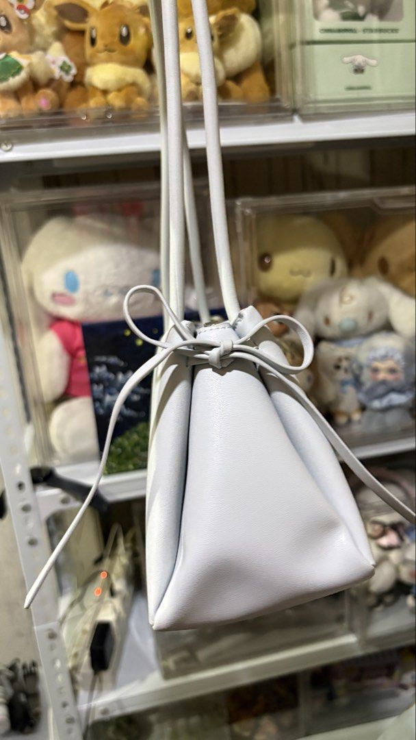 Charles & Keith Coquette Light Blue Shoulder Bag (Category: Shoulder Bags) located in Pasay City. Submitted by tiedshoelaces (Listing ID 1443324727, Image 3). Description: Please read everything: For sale: ⭐️ Charles and Keith Shoulder Bag - light/pale blue - with very cute ribbons - rarely used, in very good-excellent condition - will come with its original dust bag - main compartment: zipper - sides have magnetic closure ⭐️ price: as listed + s