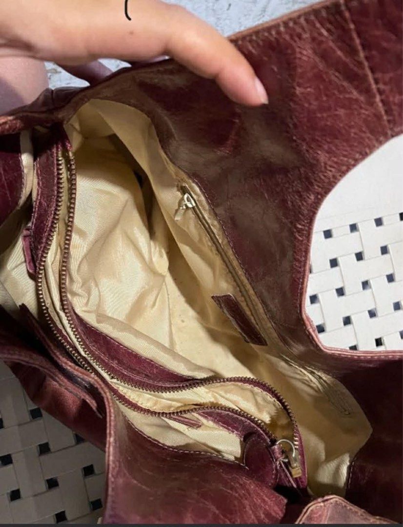 cherry red vintage vibes hobo bag (Category: Shoulder Bags) located in Cabuyao City. Submitted by kisyana (Listing ID 1433554023, Image 2). Description: - Red leather hobo bag - Single handle - Button closure - Slouchy design - Soft leather - Classic everyday bag.