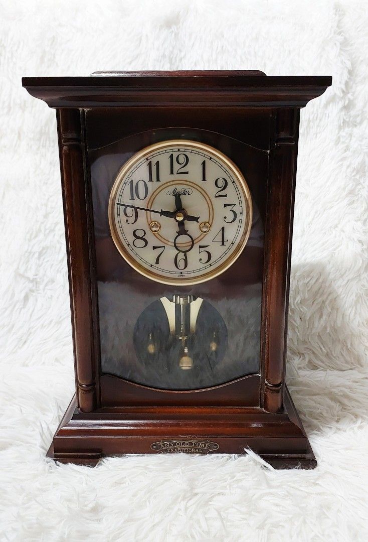 Classic Wooden Pendulum Clock (Category: Clocks) located in Binan City. Submitted by sakuratreasuresph (Listing ID 1443439458, Image 2). Description: 🕰️ Classic Wooden Pendulum Clock – Timeless Charm for Your Home! 🏡✨ 🔹 Beautiful vintage-style wooden clock with a rich, dark wood finish 🔹 Elegant pendulum design that adds a classic touch to any room 🔹 Large, easy-to-read numeral display 🔹 Perfect for living rooms, offices, study areas, or co