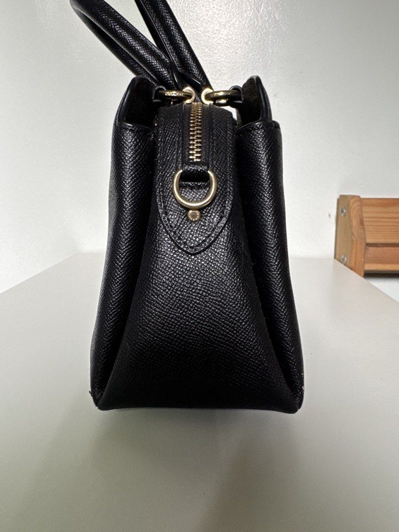 Coach Handbag (Category: Luxury Bags & Wallets) located in Batangas. Submitted by z.declutter (Listing ID 1443373632, Image 3). Description: Authentic Black Coach Handbag with detachable sling. There are dents on two corners. Please see photos for reference. Bought it yrs ago from coach outlet for almost 10k.
