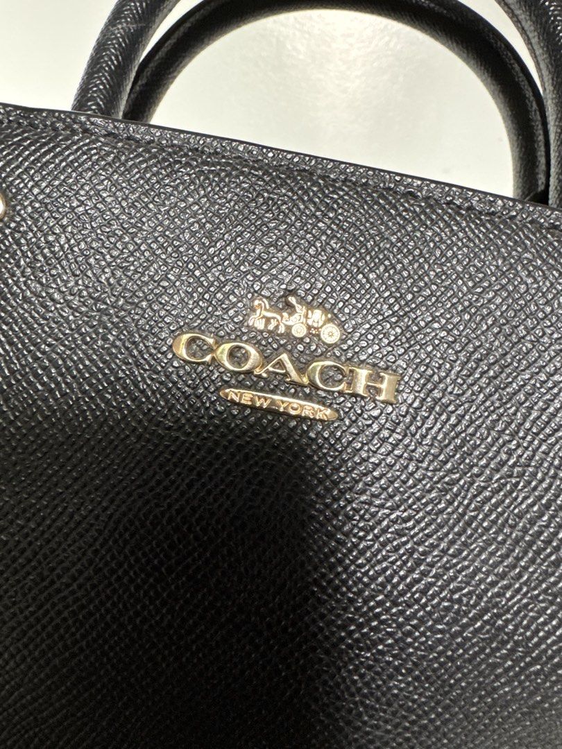 Coach Handbag (Category: Luxury Bags & Wallets) located in Batangas. Submitted by z.declutter (Listing ID 1443373632, Image 2). Description: Authentic Black Coach Handbag with detachable sling. There are dents on two corners. Please see photos for reference. Bought it yrs ago from coach outlet for almost 10k.