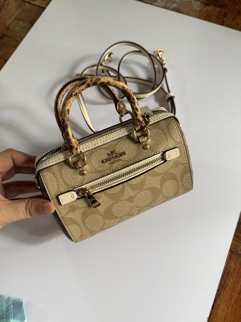 Coach Micro Rowan Crossbody Bag (Category: Luxury Bags & Wallets) located in Quezon City. Submitted by preownedbysab (Listing ID 1443369558, Image 2). Description: Coach Micro Rown Crossbody Bag In Signature Canvass 9.9/10 condition With minimal discoloration in the hardware but unnoticeable unless you will check it closely Location: Tandang Sora, Quezon City I can do meet up or logistics RFS: No longer being used 100% Authentic bought in the US 
