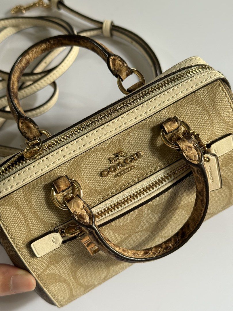 Coach Micro Rowan Crossbody Bag (Category: Luxury Bags & Wallets) located in Quezon City. Submitted by preownedbysab (Listing ID 1443369558, Image 3). Description: Coach Micro Rown Crossbody Bag In Signature Canvass 9.9/10 condition With minimal discoloration in the hardware but unnoticeable unless you will check it closely Location: Tandang Sora, Quezon City I can do meet up or logistics RFS: No longer being used 100% Authentic bought in the US 