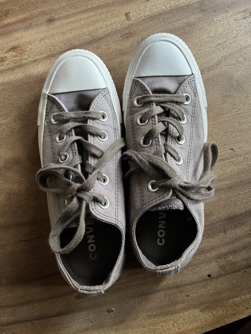 Converse All Star Low Top Sneakers - Grey (Category: Sneakers) located in Pasig City. Submitted by A7closet (Listing ID 1443496823, Image 1). Description: - Classic grey Converse All Star low tops - Durable canvas material - White laces and rubber toe cap - Iconic All Star logo on heel - Soles show minimal wear - Ideal for everyday wear -almost new.