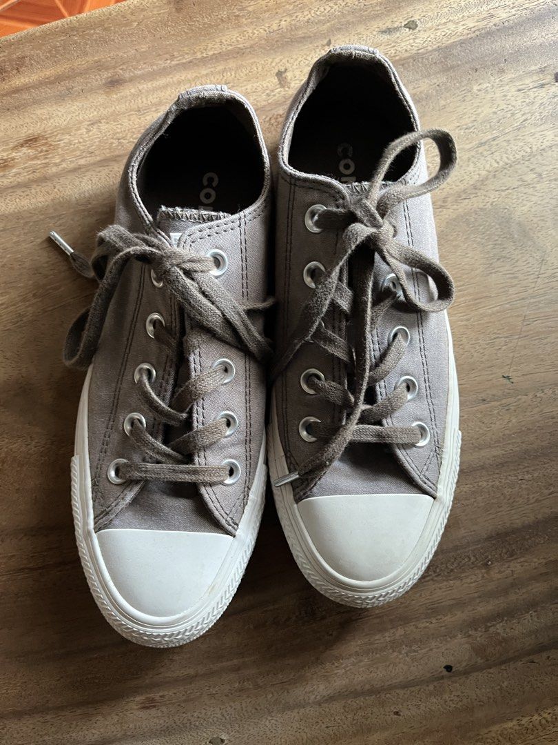 Converse All Star Low Top Sneakers - Grey (Category: Sneakers) located in Pasig City. Submitted by A7closet (Listing ID 1443496823, Image 2). Description: - Classic grey Converse All Star low tops - Durable canvas material - White laces and rubber toe cap - Iconic All Star logo on heel - Soles show minimal wear - Ideal for everyday wear -almost new.