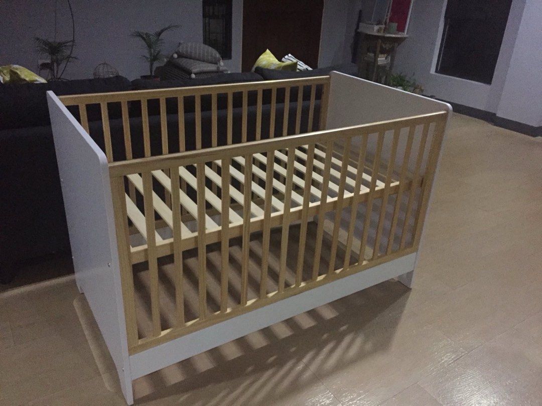 Cuddlebug Vernon Crib (Category: Cots & Cribs) located in Paranaque City. Submitted by emc_20 (Listing ID 1443424236, Image 1). Description: A crib that converts into a toddler bed and daybed. • Material: Solid pine wood / MDF • Non- toxic, lead-free paint • 3 mattress adjustment heights (crib) • Fits 28”x52” mattress (not included) • Crib railings with teething guard • Conversion kits included. • Dimension: 137” x 82” x 17” *Original price is 14