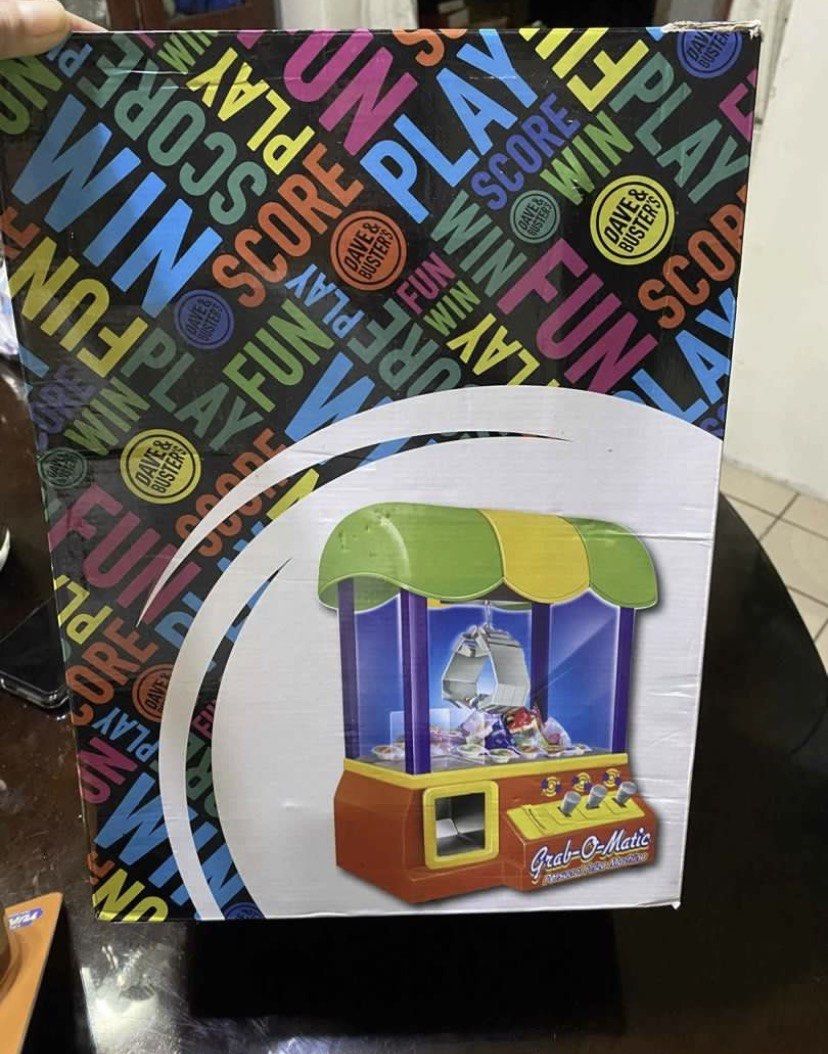 Dave and Buster’s Claw Machine Toy (Category: Interactive Toys) located in Pasig City. Submitted by xhuming-2 (Listing ID 1443451721, Image 2). Description: • galing Japan • with lights and sound • halos bago pa may lamat na kaunti sa harap •working • see pictures for flaws.