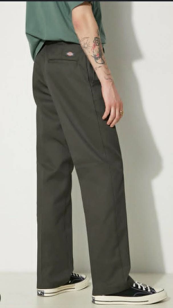 Dickies 874 Work Pants Dark Green (Category: Chinos) located in Sibulan. Submitted by rajmage777 (Listing ID 1443346770, Image 1). Description: - Classic Dickies 874 work pants - Color: Dark Green - Fit: Straight - Material: Durable Twill Fabric - Features: Iconic Dickies logo patch on back pocket - Ideal for: Everyday wear or work.