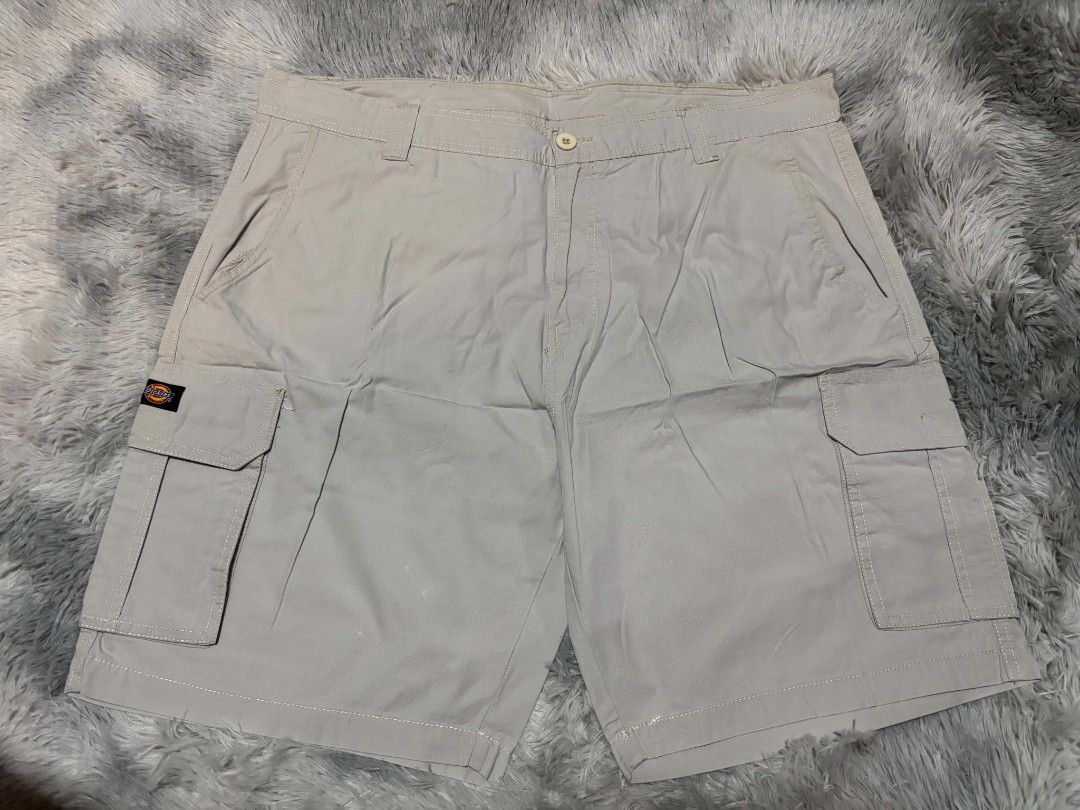Dickies Cargo Shorts Beige Men's Size 36 (Category: Shorts) located in Manila. Submitted by jmatias (Listing ID 1443447070, Image 1). Description: - Dickies cargo shorts - Waist Size 41 - Light beige color - Classic cargo style with multiple pockets - Button and zip fly - Comfortable fit - Great for casual wear or work - Please check photos for details - Loc Sampaloc Manila.