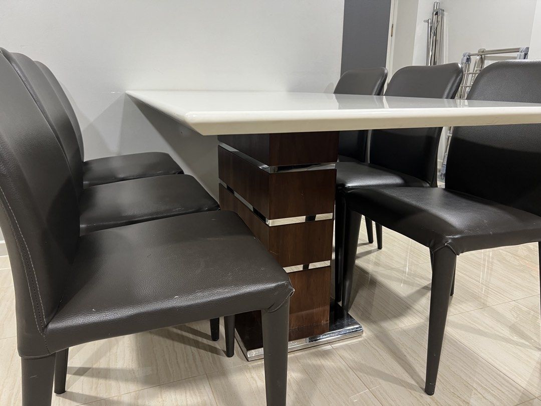 Dining Table (Category: Tables & Sets) located in Singapore. Submitted by mdm_choo (Listing ID 1443320458, Image 2). Description: - White rectangular dining table - Tabletop is smooth and easy to clean Length: 1600mm Weight: 850mm Height: 755mm Self collection only..