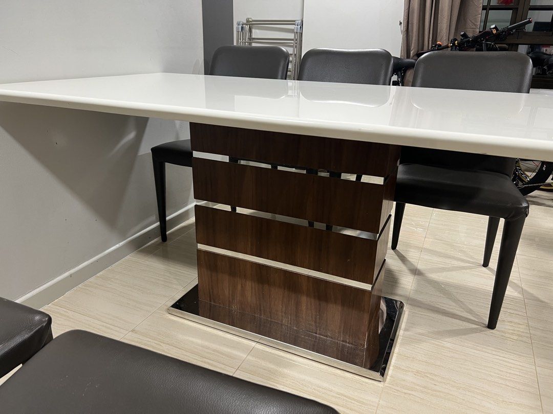 Dining Table (Category: Tables & Sets) located in Singapore. Submitted by mdm_choo (Listing ID 1443320458, Image 3). Description: - White rectangular dining table - Tabletop is smooth and easy to clean Length: 1600mm Weight: 850mm Height: 755mm Self collection only..