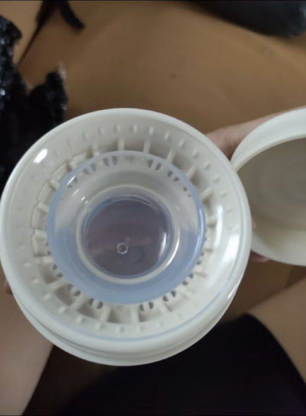 Dr. Isla Training cup (Category: Breastfeeding & Bottle Feeding) located in Rizal. Submitted by decluttrmomma (Listing ID 1443322275, Image 2). Description: - Adorable baby bottle featuring cute sea creatures like seahorses and fish. - Clear bottle with a light blue tint and vibrant, colorful illustrations. - Includes a secure white lid. - Designed for easy handling, making feeding time more convenient. - Ideal for feeding your little one. RFS: a