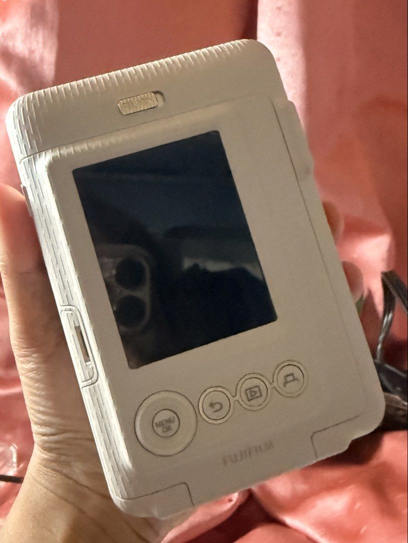 Fujifilm Instax Mini LiPlay Hybrid (Category: Cameras) located in Manila. Submitted by lorelyndia22589 (Listing ID 1443443031, Image 2). Description: Fujifilm Instax Mini LiPlay Hybrid No box, just charging cord No dents, used 3-4x only Good as new .