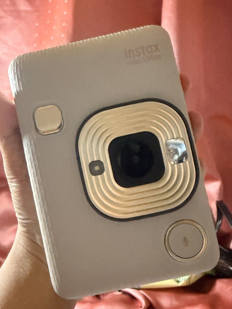 Fujifilm Instax Mini LiPlay Hybrid (Category: Cameras) located in Manila. Submitted by lorelyndia22589 (Listing ID 1443443031, Image 1). Description: Fujifilm Instax Mini LiPlay Hybrid No box, just charging cord No dents, used 3-4x only Good as new .