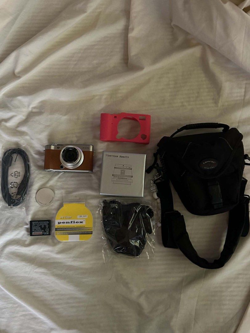 Fujifilm Xa10 with TTArtisan 35mm (Category: Cameras) located in Puerto Princesa. Submitted by nndrei (Listing ID 1443326476, Image 1). Description: Fujifilm X-A10 (Brown) - flash working - shutter working - body is 6/10 cosmetic issues (screen has scratches, body has signs of usage, faded paint etc) - small screen issue (visible only kapag dark ang screen, hindi nakakaaffect sa pics) inclusions - fujifilm x-a10 camera body - brand new ttartisan 