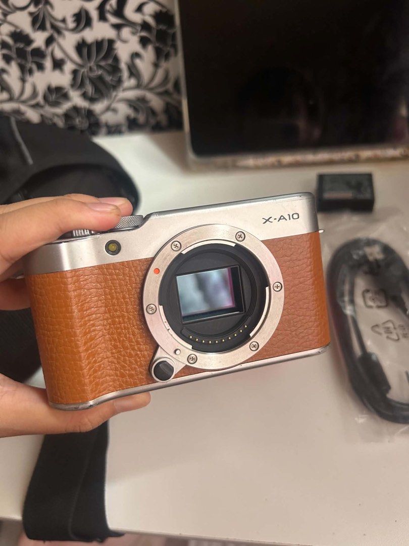 Fujifilm Xa10 with TTArtisan 35mm (Category: Cameras) located in Puerto Princesa. Submitted by nndrei (Listing ID 1443326476, Image 2). Description: Fujifilm X-A10 (Brown) - flash working - shutter working - body is 6/10 cosmetic issues (screen has scratches, body has signs of usage, faded paint etc) - small screen issue (visible only kapag dark ang screen, hindi nakakaaffect sa pics) inclusions - fujifilm x-a10 camera body - brand new ttartisan 
