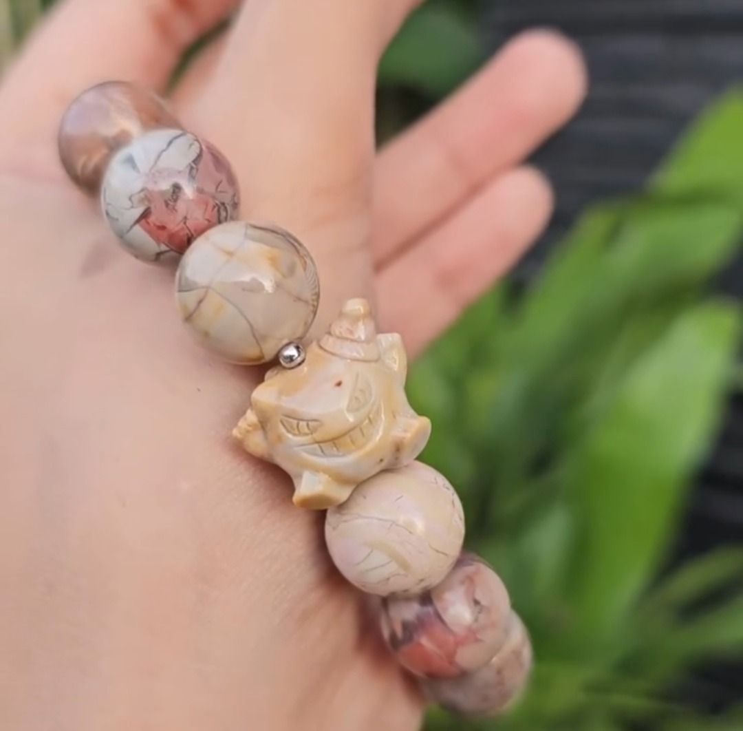 Gengar alashan agate full bead bracelet 18CM (Category: Bracelets) located in Pasig City. Submitted by cetleo (Listing ID 1443403985, Image 2). Description: - Unique natural stone beads with distinct patterns - Adorable Pokemon-inspired charm included - Adds a fun and playful element to your style - Comfortable, one-size-fits-most design.