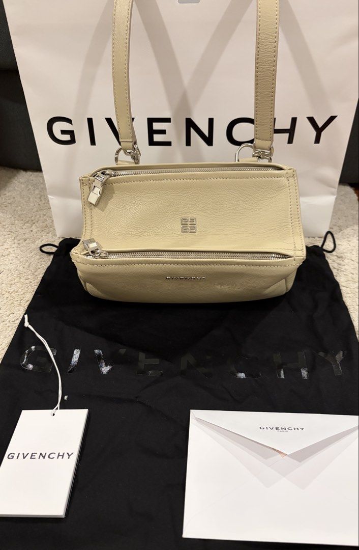Givenchy Mini Pandora Beige Leather (Category: Luxury Bags & Wallets) located in Taguig. Submitted by ellejay8 (Listing ID 1440678408, Image 2). Description: - Brand New Authentic Givenchy beige leather cross body bag - Complete with paper bag and dust bag - Two zippered compartments for secure storage.
