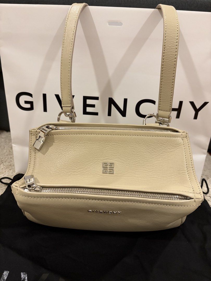 Givenchy Mini Pandora Beige Leather (Category: Luxury Bags & Wallets) located in Taguig. Submitted by ellejay8 (Listing ID 1440678408, Image 3). Description: - Brand New Authentic Givenchy beige leather cross body bag - Complete with paper bag and dust bag - Two zippered compartments for secure storage.