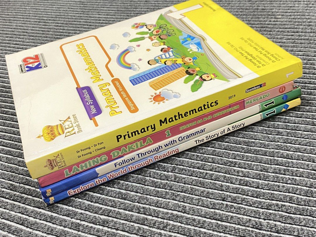 Grade 1 K-12 Textbooks (Category: Textbooks) located in Quezon City. Submitted by reysiyel (Listing ID 1443435378, Image 2). Description: - Grade 1 K-12 Textbooks - Selling all 4 books as a set for Php900 - actual state shown in posted photos to manage expectations - Can be bought per pc: 1 - Primary Mathematics 1, Php650 2 - Explore the World through Reading 1, Php250 3 - Follow through with Grammar 1, Php250 4 - Lahing Dakila 1, Php250 ** Not a
