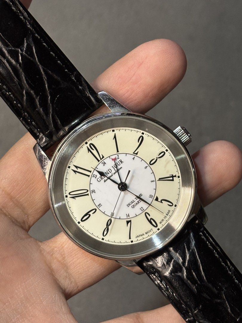 Grand Jour Dual Time Limited Edition (Category: Men's Watches) located in Manila. Submitted by soughtafterseconds (Listing ID 1443379945, Image 2). Description: Grand Jour Dual Time Limited Edition This vintage Grand Jour Dual Time Limited Edition is an absolute stunner of a traveler’s watch. Shifting away from Grand Jour’s typical dainty dress codes, this JDM-exclusive piece features a dual-layered cream dial with a 24-hour crosshair inner track